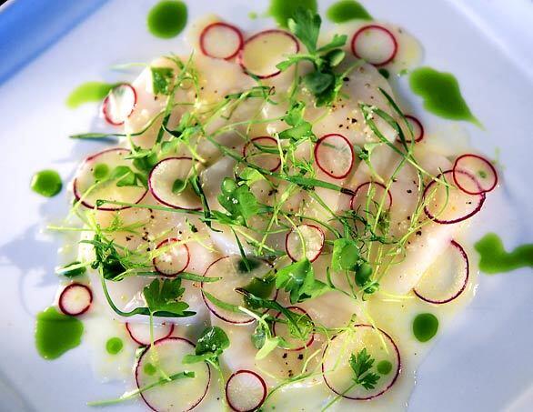 Rustic Canyon is the hit of its Santa Monica neighborhood for its seasonal menu built on fresh ingredients. Among the offerings, a diver scallop crudo with fennel shoot celery salad and micro basil.