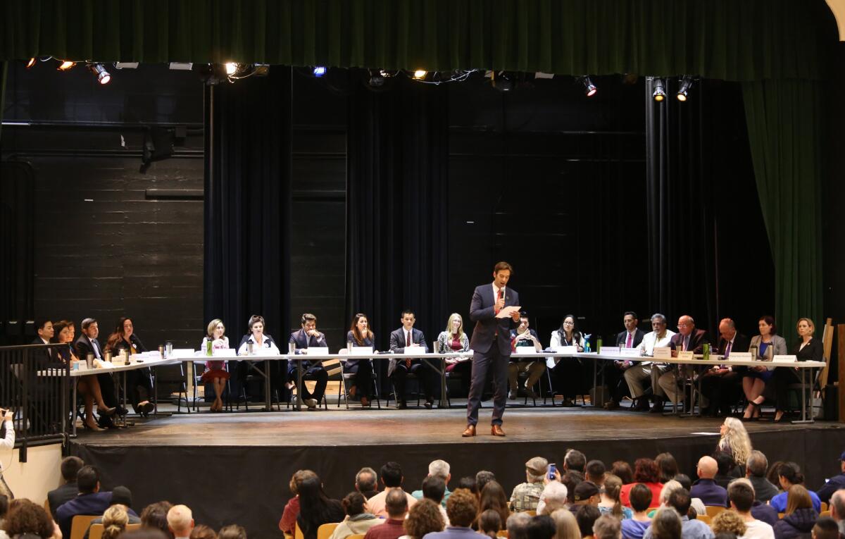 Most of the 24 candidates for the 34th Congressional District appear at a forum in Eagle Rock on March 22.