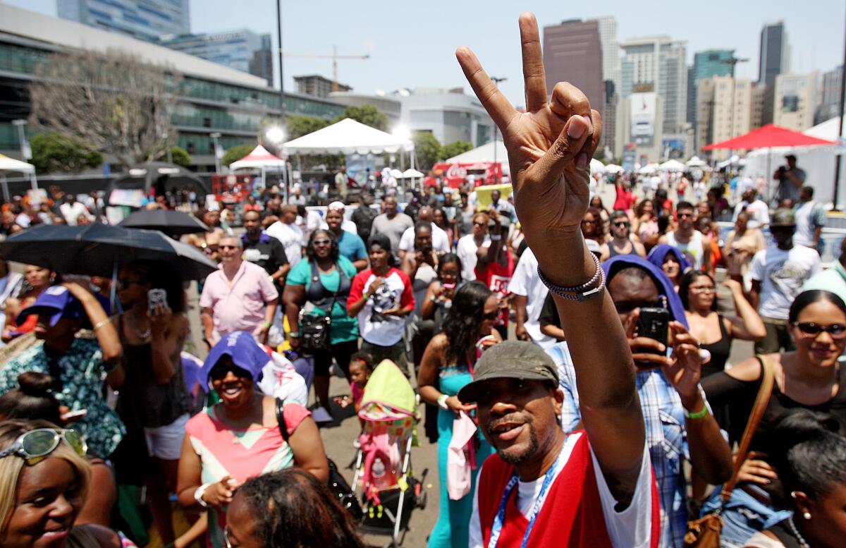 Crowds brave the heat to participate in the BET Awards Fan Fest at L.A. Live in Los Angeles on Saturday, June 29, 2013. Thousands of people attended the daylong festivities, which featured food, dancing and music.