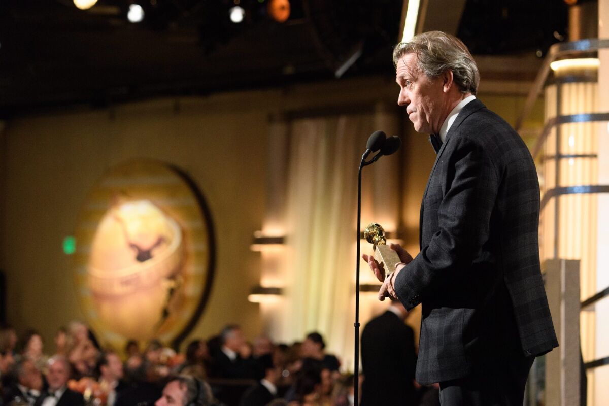 Hugh Laurie accepting the Golden Globe Award for supporting actor in a series, mini-series or motion picture made for television for his role in 'The Night Manager.'
