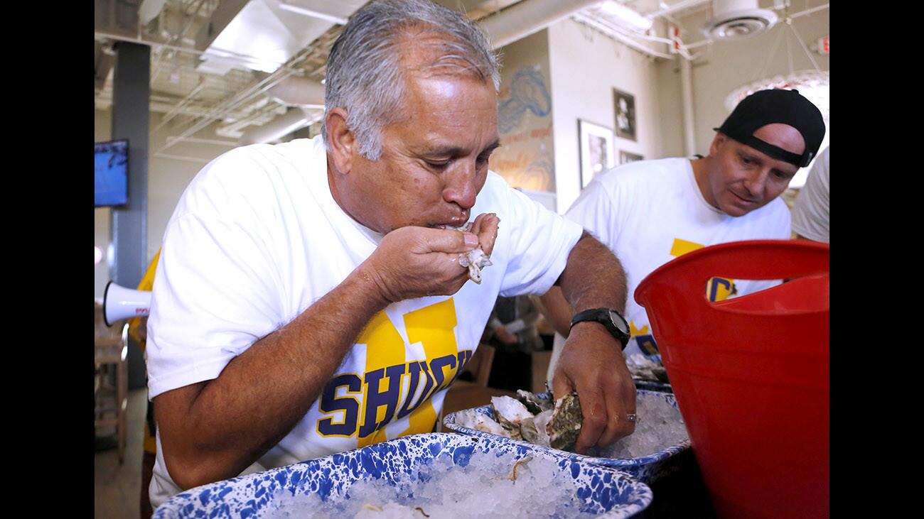 Photo Gallery: Huntington Beach PD retains oyster-eating title at Ways & Means Oyster House charity fundraiser