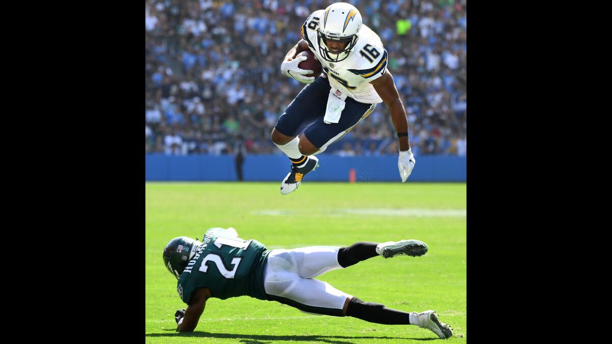 Chargers receiver Tyrell Williams is upended by Eagles cornerback Patrick Robinson in the 2nd quarter in Carson.