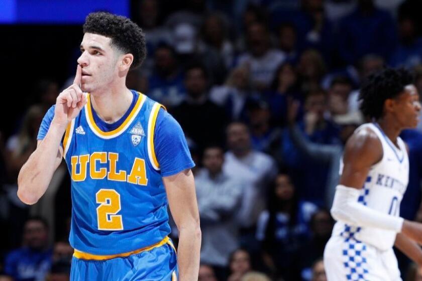 UCLA's Lonzo Ball reacts after making a three-pointer against Kentucky on Saturday.