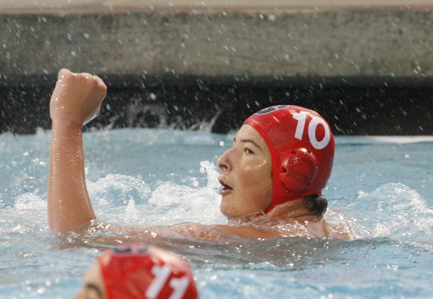 Glendale's Arman Momdzhyan fist pumps after scoring against Burroughs in a CIF boys water Pacific League prelim at Burbank High School on Tuesday, October 30, 2012.