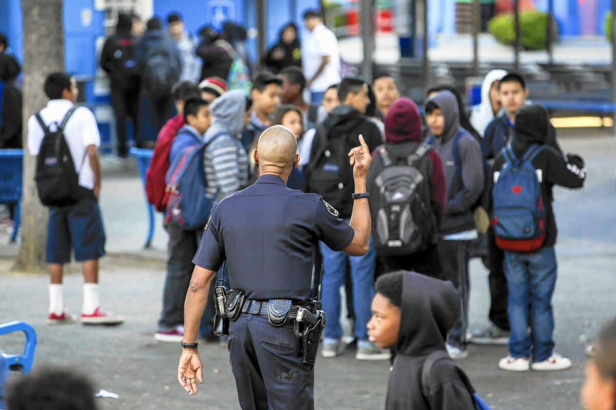 Los Angeles Unified School Police Officer Henry Anderson on his beat at Peary Middle School in Gardena.