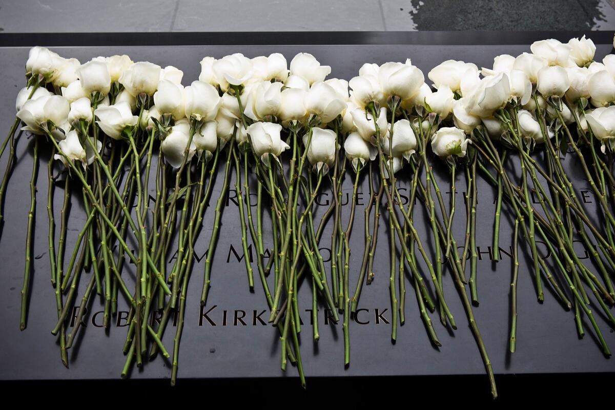 Roses lay at the memorial site after a ceremony marking the 20th anniversary of the 1993 World Trade Center bombing.