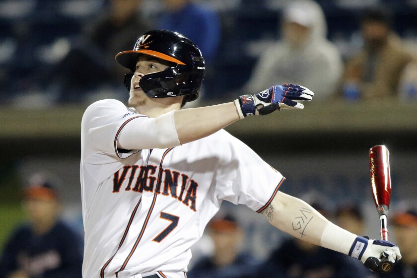 FILE - In this Feb. 14, 2020, file photo, Virginia's Devin Ortiz bats against Oklahoma during an NCAA baseball game in Pensacola, Fla. The senior from Nutley, N.J., embodies the resiliency the Cavaliers (33-24) have demonstrated during a dramatic turnaround to their season. (AP Photo/Dan Anderson, File)