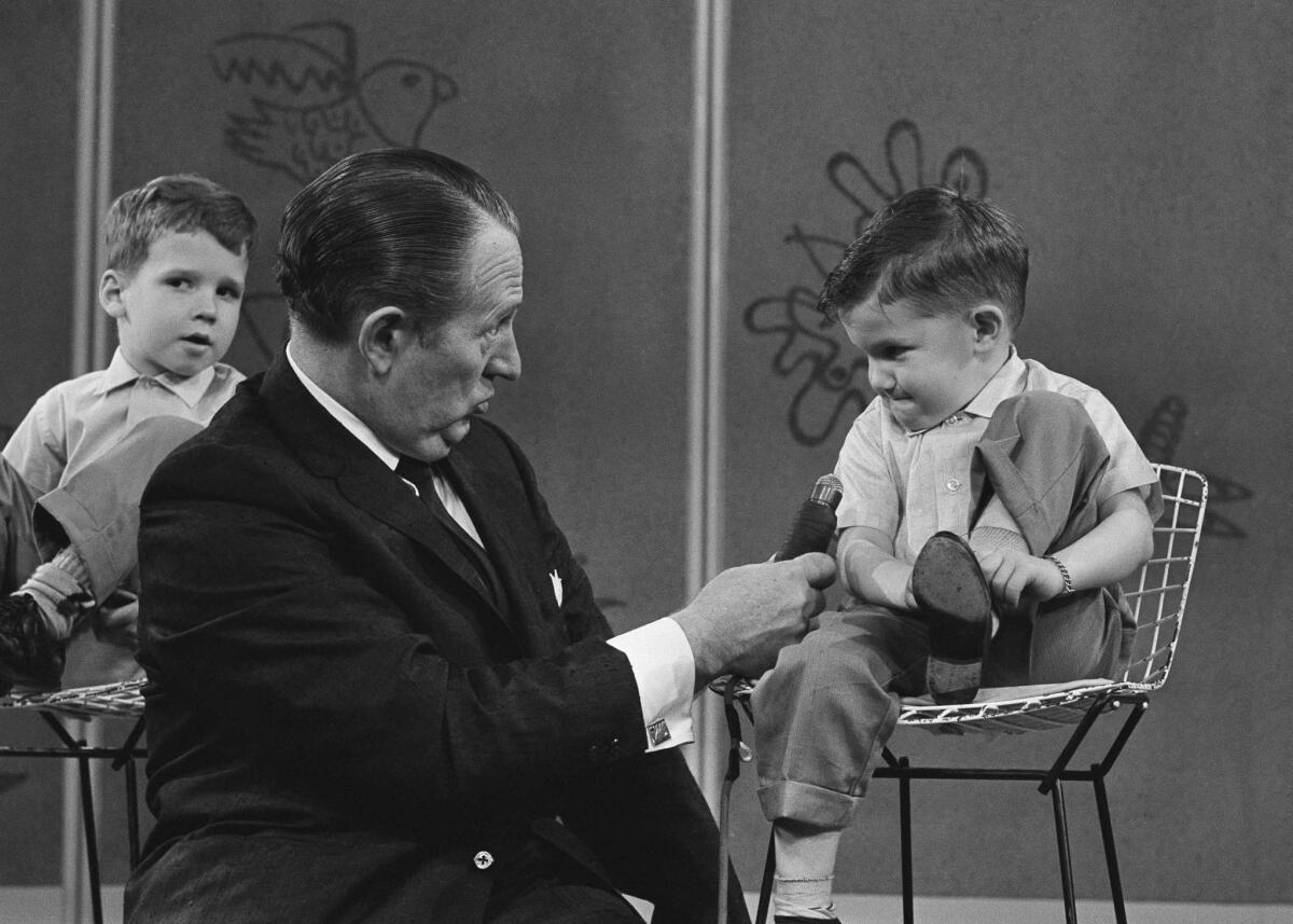 Art Linkletter interviews 4-year-old Ronnie Glahn on his show in 1962.