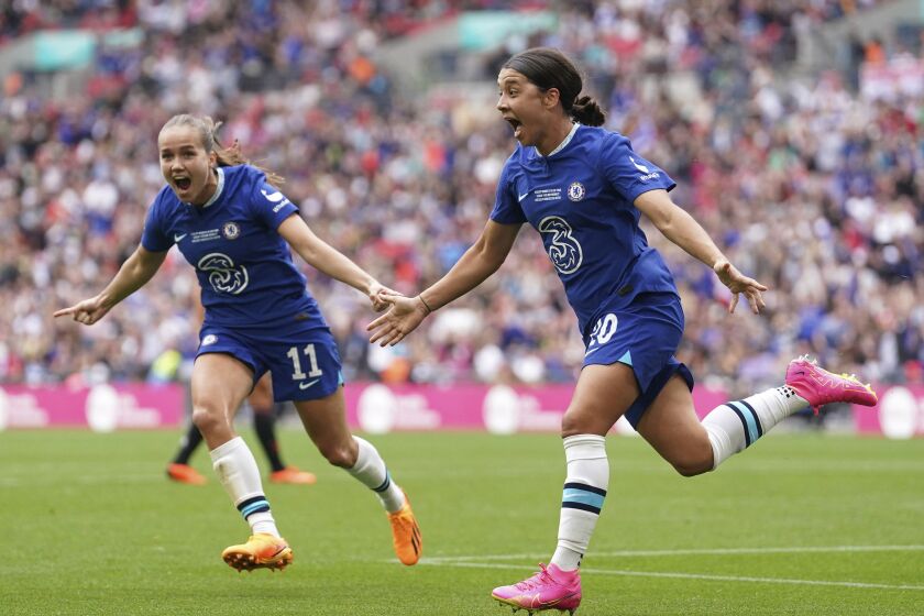 Chelsea's Sam Kerr, right, celebrates scoring their side's first goal of the game during the Vitality Women's FA Cup final at Wembley Stadium in London on Sunday, May 14, 2023. A world record crowd of 77,390 watched Chelsea beat Manchester United 1-0 in the Women’s FA Cup final. (Adam Davy/PA via AP)