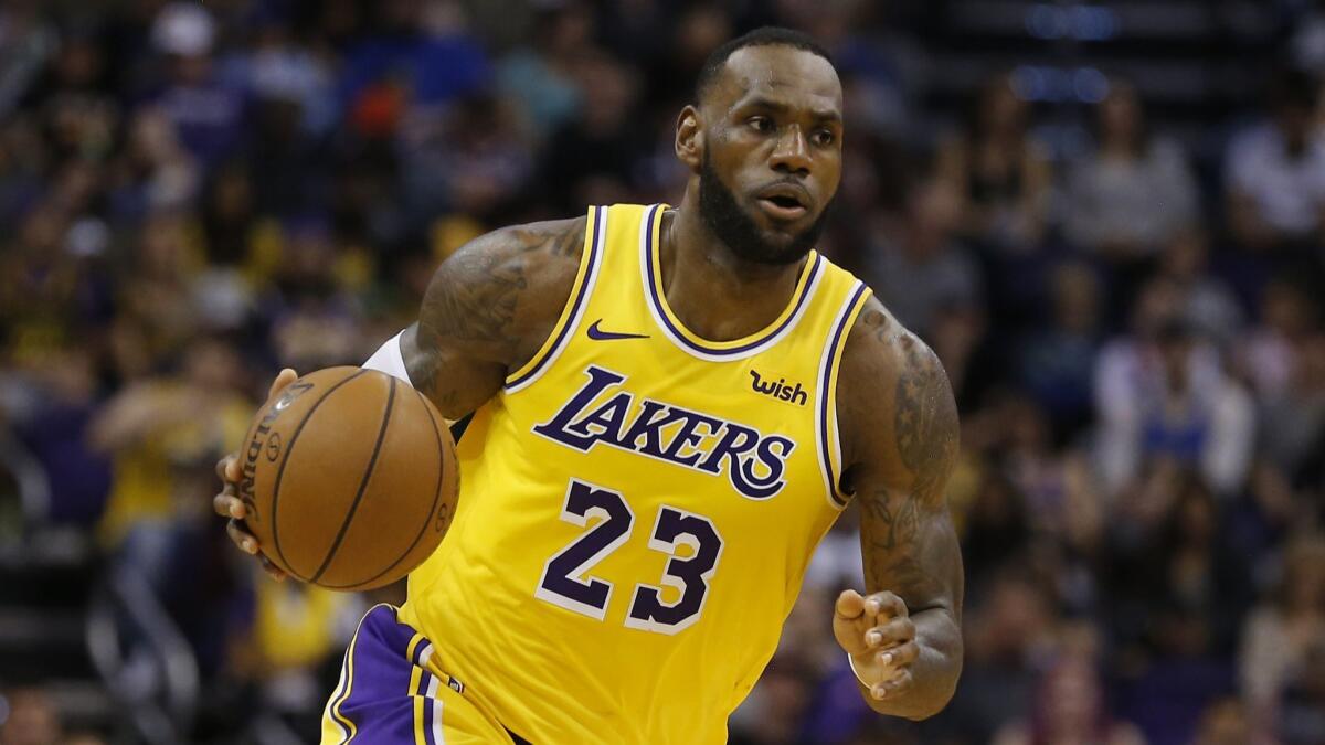 Lakers forward LeBron James controls the ball during a game against the Phoenix Suns on March 3.