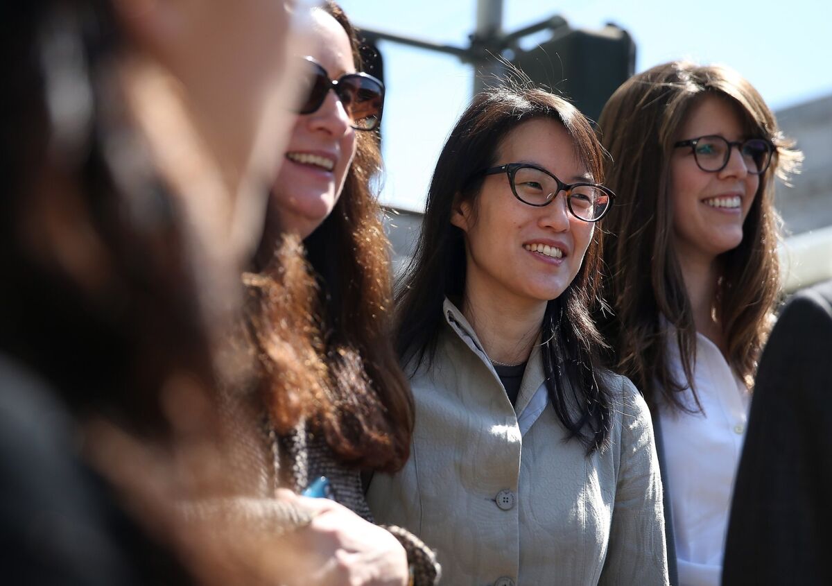 Ellen Pao (center) leaves the San Francisco Superior Court Civic Center Courthouse with her legal team during a lunch break from her trial on March 25.