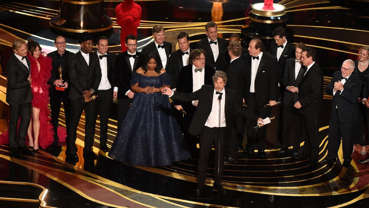 Producers of Best Picture winner "Green Book" Peter Farrelly and Nick Vallelonga accepts the award with the entire crew on stage during the 91st Academy Awards at the Dolby Theatre in Hollywood on Sunday.