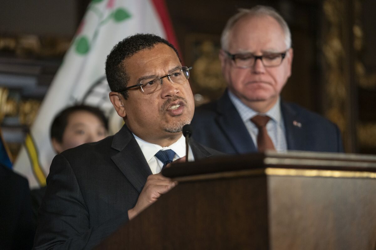 FILE - Minnesota Attorney General Keith Ellison speaks at a press conference at the State Capitol on Dec. 4, 2019, in St. Paul, Minn. Ellison is slated to lead off opening statements expected for Tuesday, March 28, 2023, in his state's lawsuit against Juul Labs – marking the first time any of the thousands of cases against the e-cigarette maker over its alleged marketing to young people is going to play out in a courtroom. (Renee Jones Schneider/Star Tribune via AP, File)