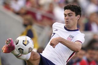 American Gio Reyna controls the ball during a 2021 match against Costa Rica 