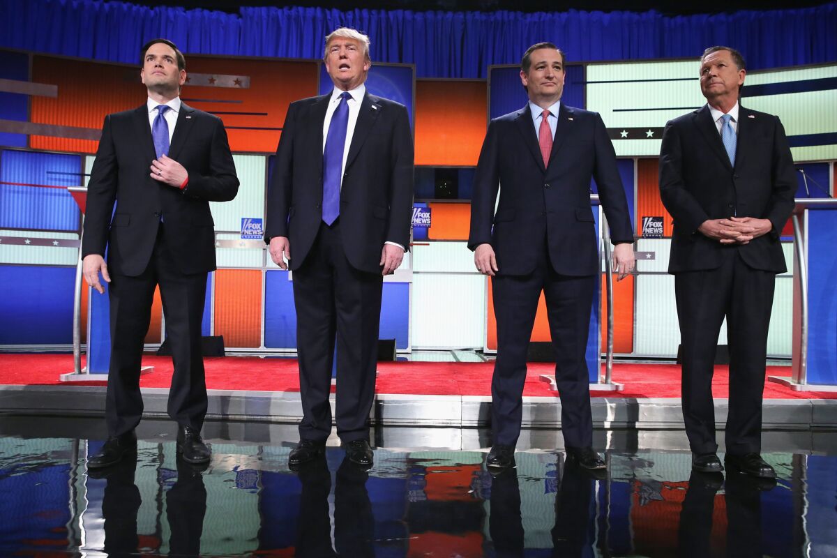 Republican presidential candidates Sen. Marco Rubio, Donald Trump, Sen. Ted Cruz, and Ohio Gov. John Kasich, participates in a debate sponsored by Fox News in Detroit, Michigan.