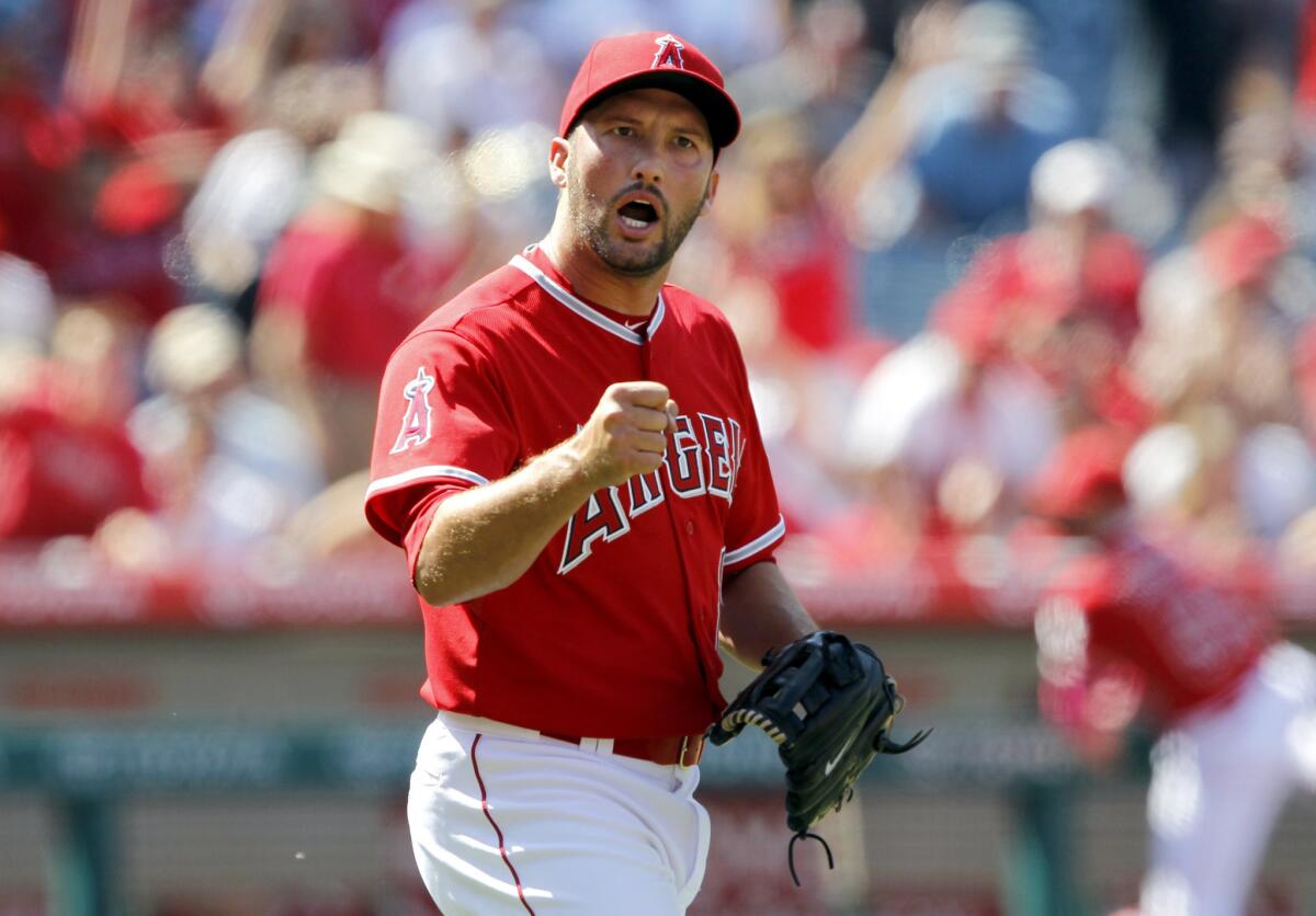 Angels closer Huston Street reacts after getting the final out against the Astros to clinch a save.