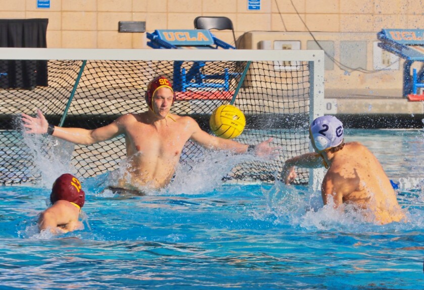 Cal’s Max Casabella scores the first of his four goals on a five-meter shot against USC goalie Nic Porter.