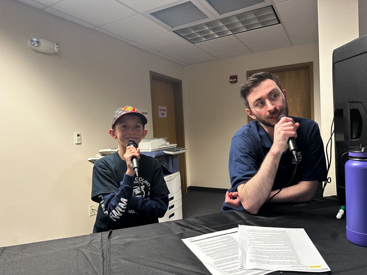 Student leader Ruxim Graham, left, and Unified Esports League assistant manager Tamaz Bolkvadze at a Dec. 16 competition.