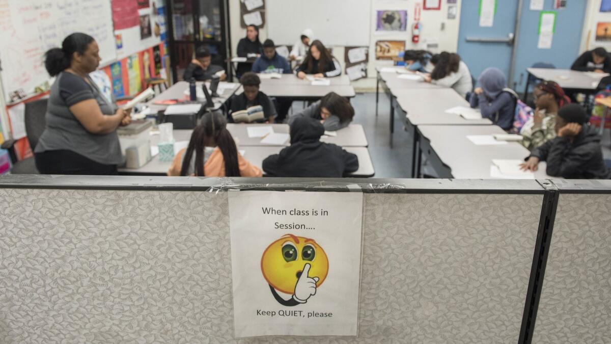 Students at Magnolia Science Academy 3 learn in a makeshift classroom created with dividers in the school's office space. Efforts to rent empty additional empty space on the campus of Curtiss Middle School in Carson have hit roadblocks.
