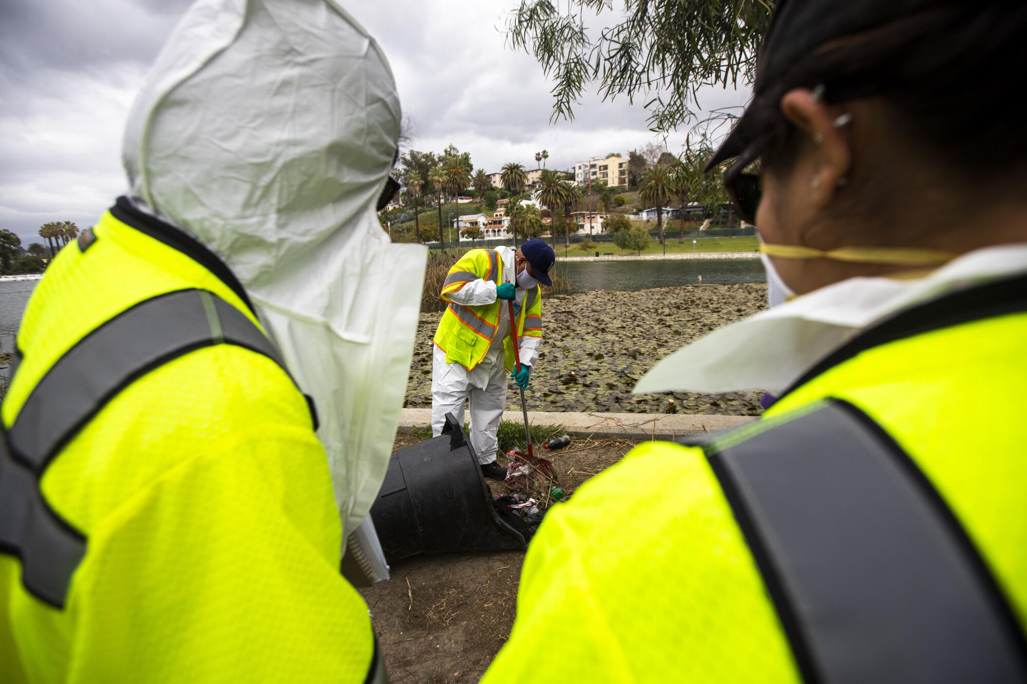 A sanitation crew cleans up.