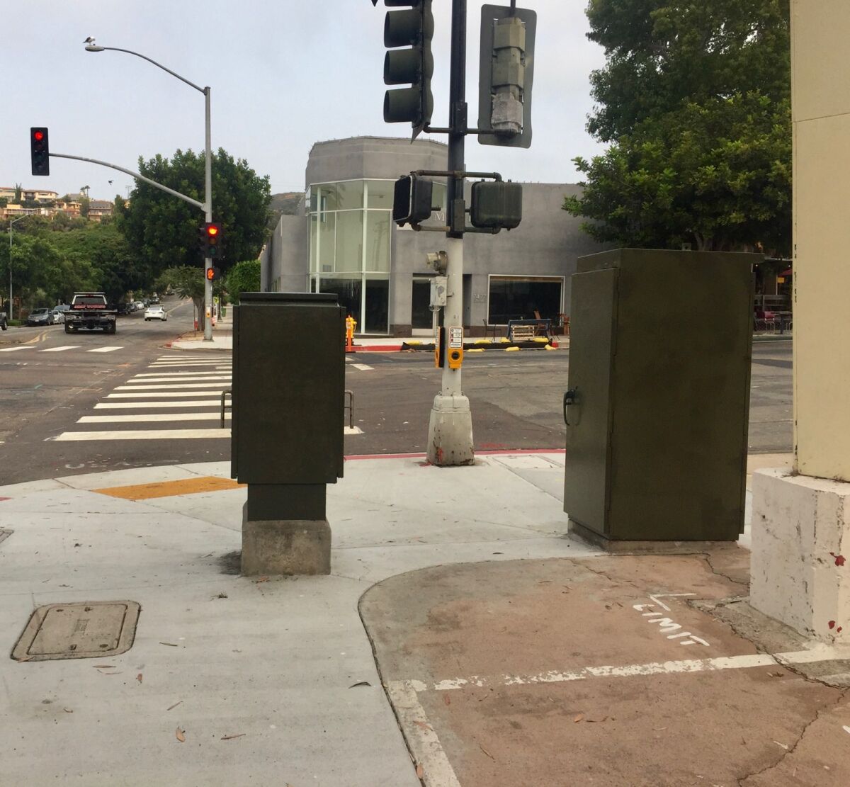 Utility boxes at Pearl Street and Girard Avenue after a paint job by Enhance La Jolla.