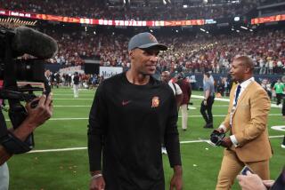 LAS VEGAS, NV - SEPTEMBER 01: USC Trojans defensive coach D'Anton Lynn.