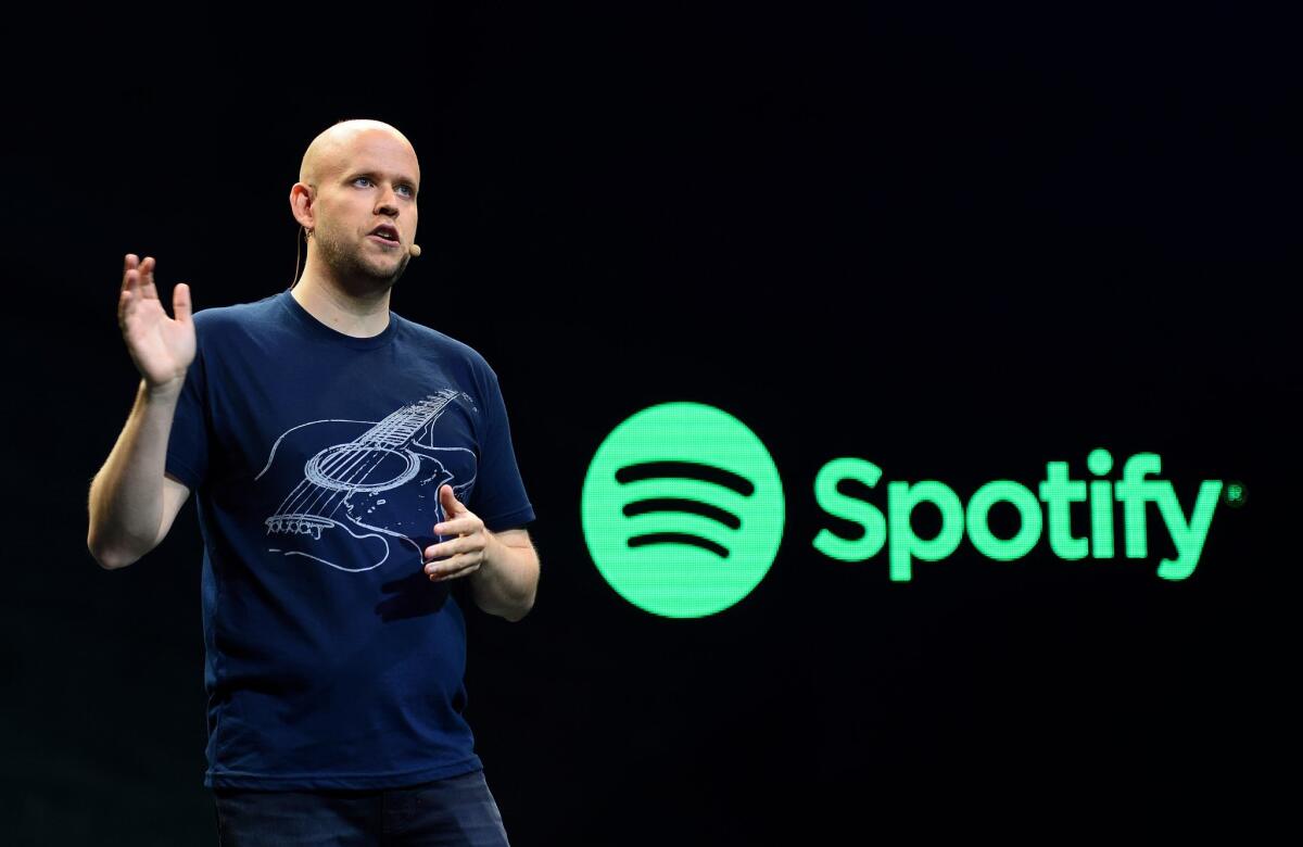 Daniel Ek, CEO of Spotify, speaks to reporters at a New York news conference in May.