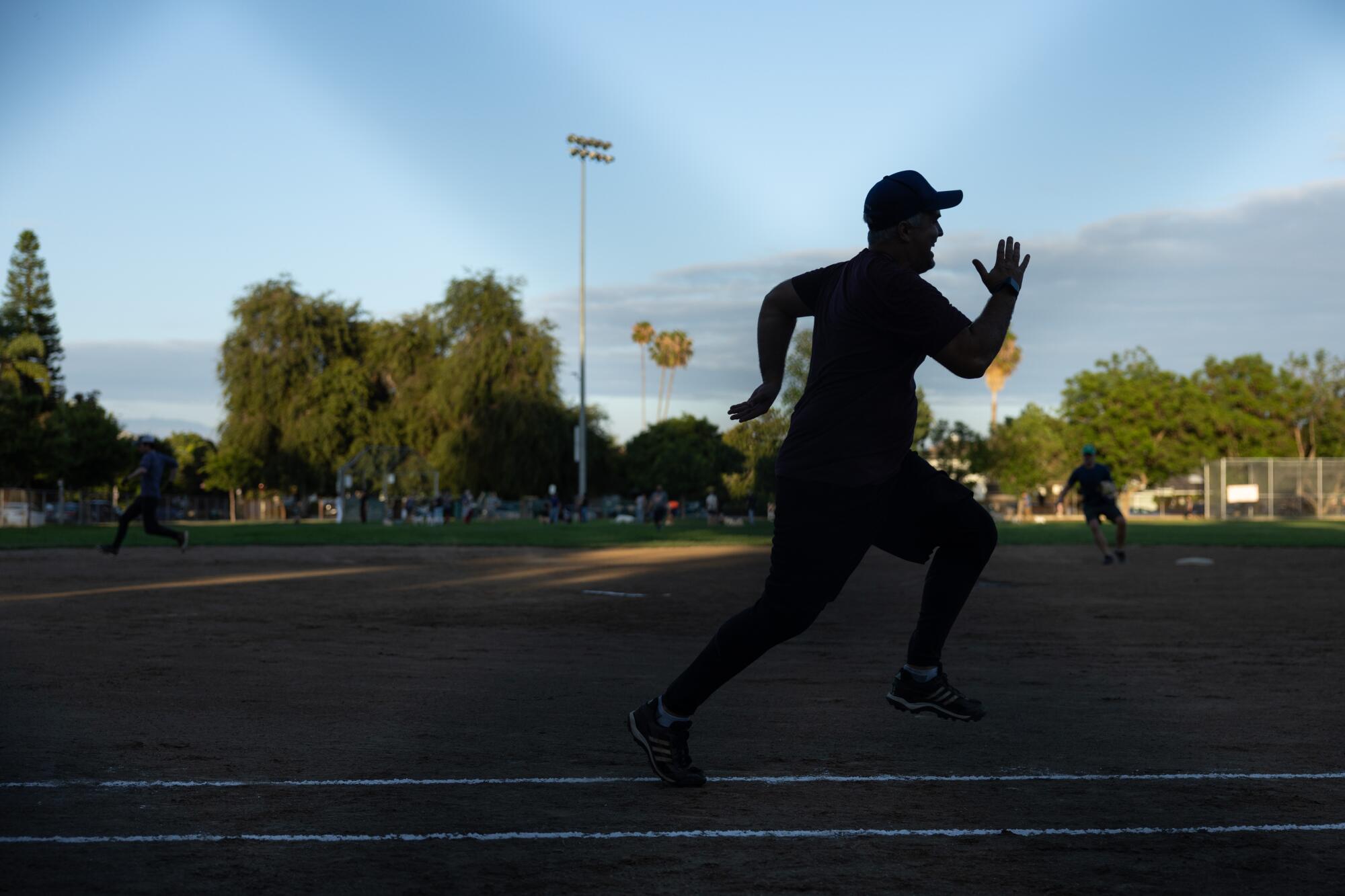 A person runs outdoors.