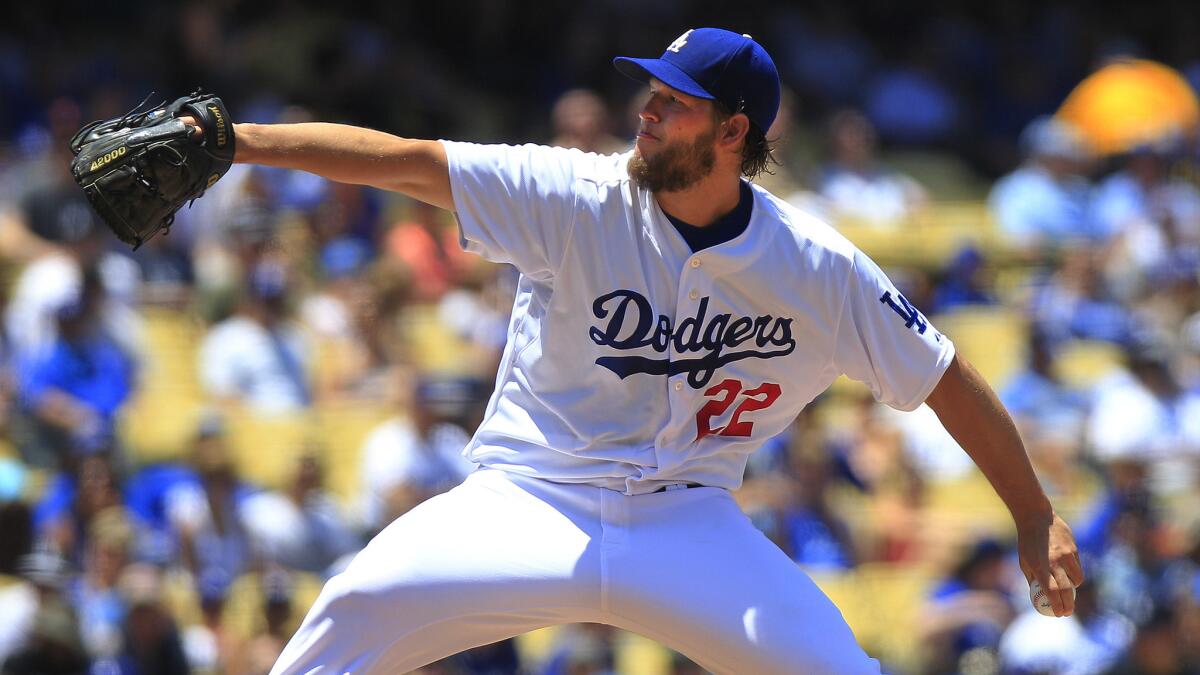 Dodgers starter Clayton Kershaw delivers a pitch during the first inning of Sunday's game against the St. Louis Cardinals.