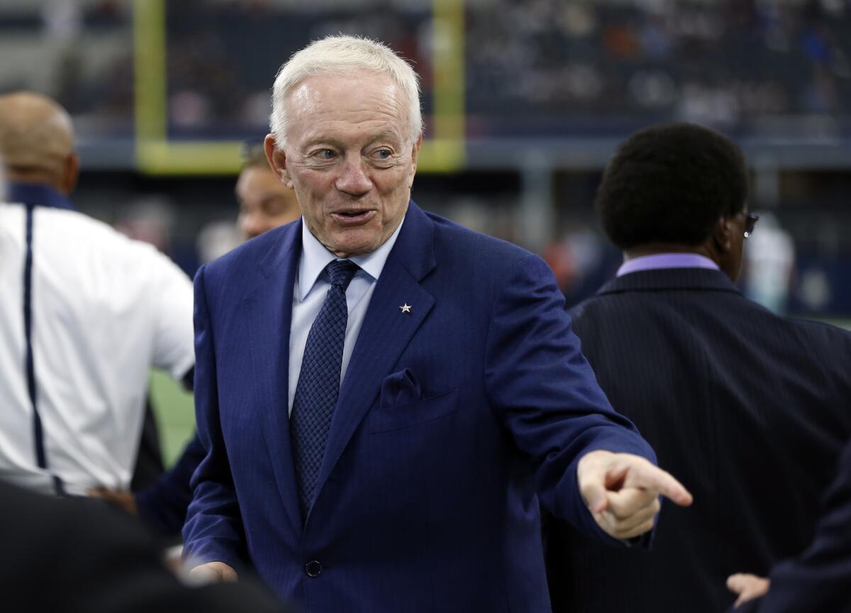 Dallas Cowboys owner Jerry Jones watches his team warm up on Sept. 27.