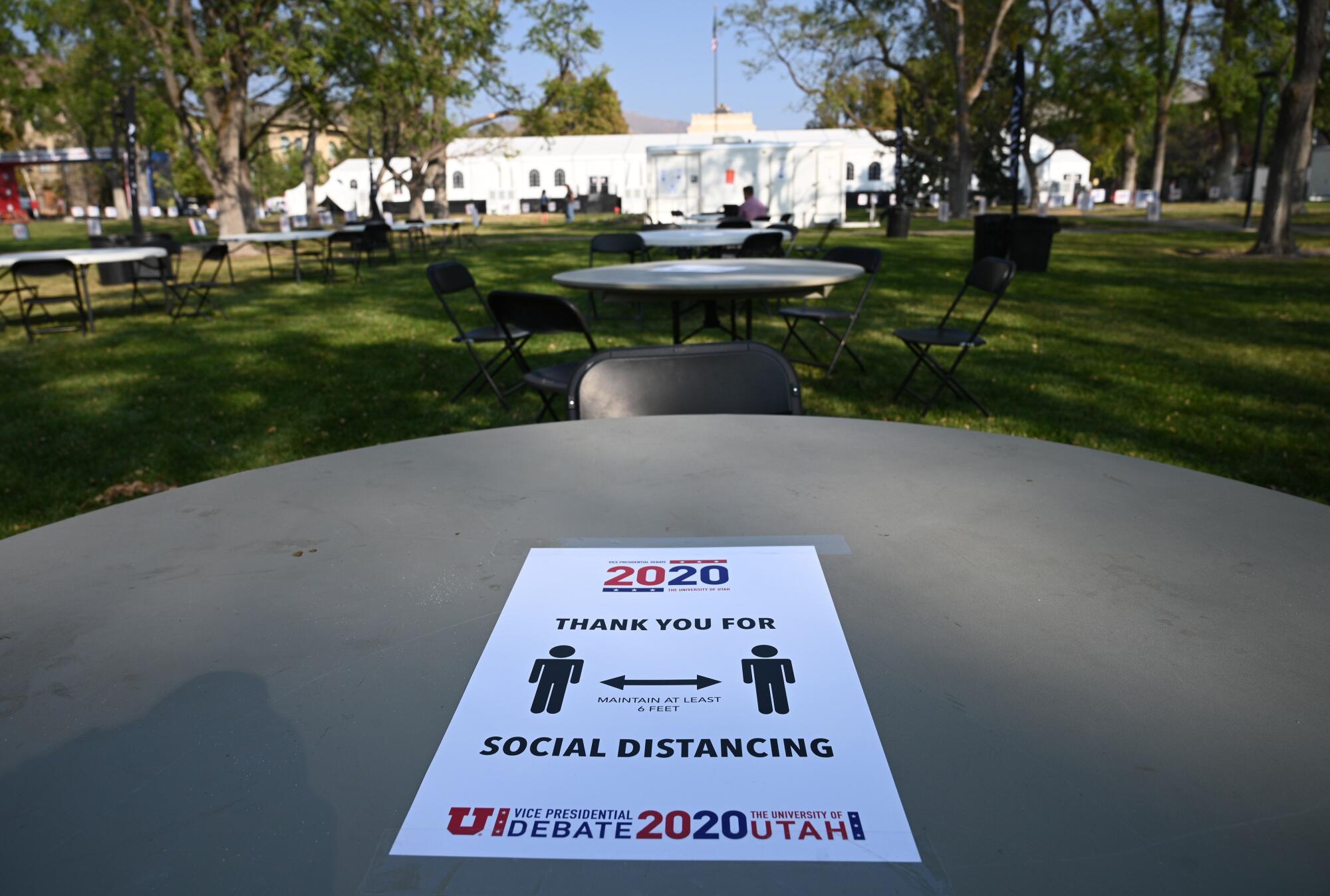 A sign for the vice presidential debate says thank you for social distancing
