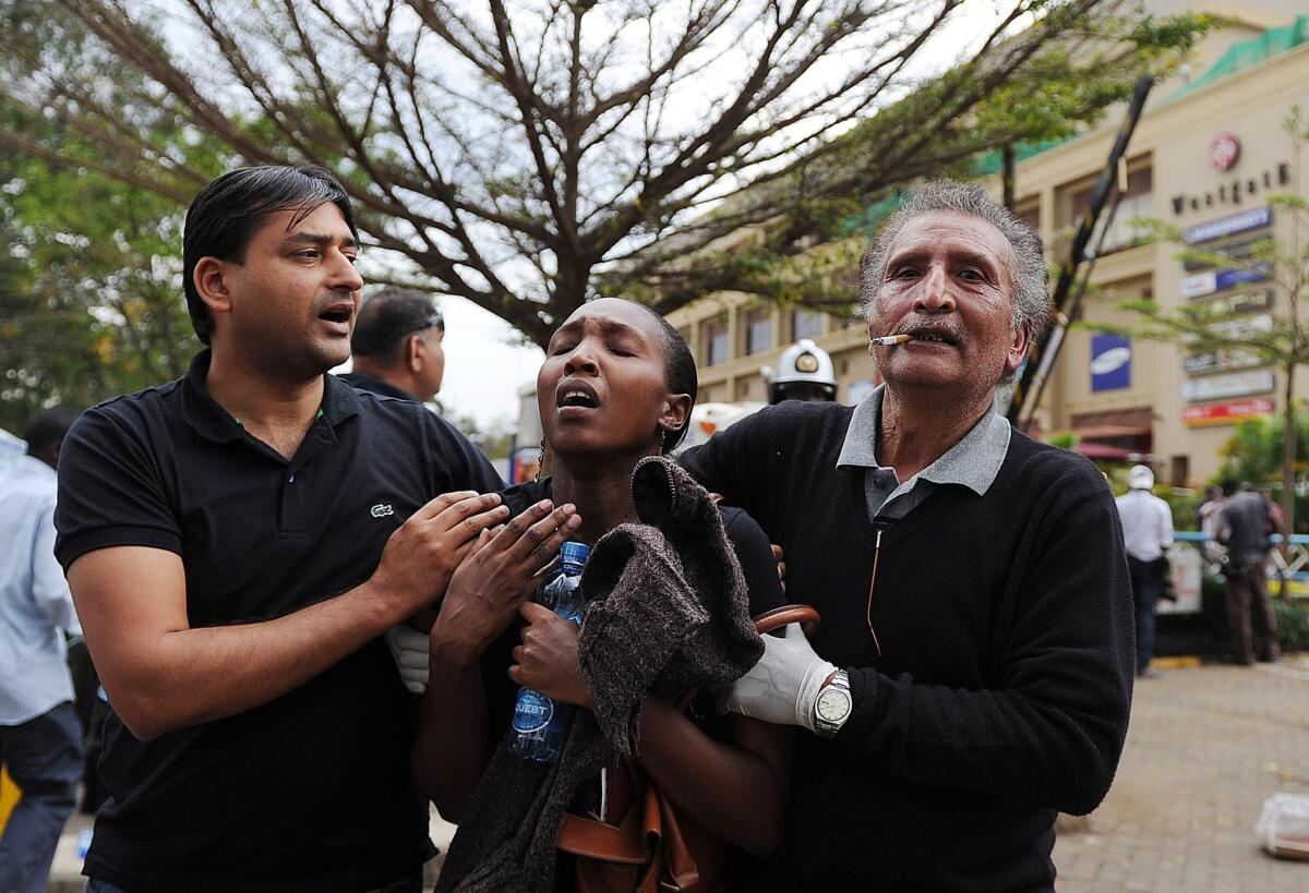 A woman who had been held hostage was freed after a security operation at an upscale shopping mall in Nairobi. At least 11 people were killed, with some reports putting the number higher than 22.