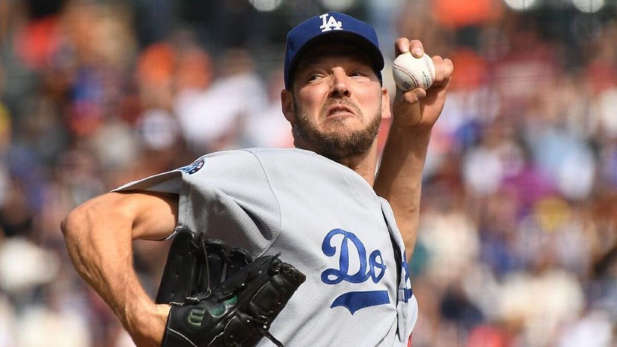 Rich Hill delivers seven nearly perfect innings for Dodgers against the San Francisco Giants on Sunday.