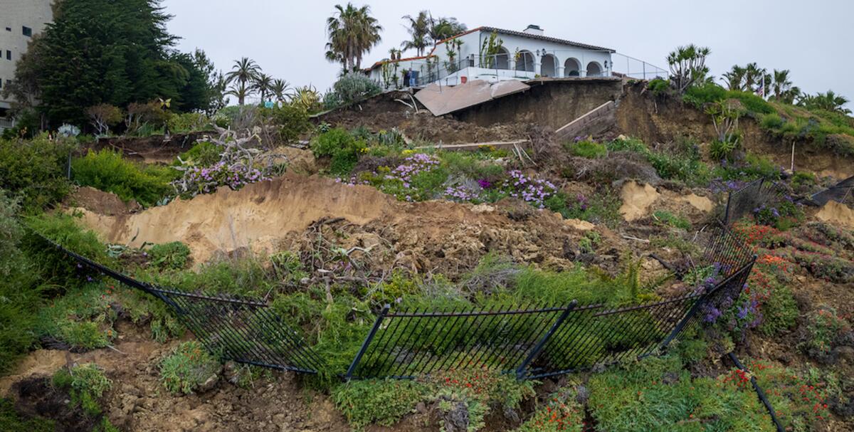 Casa Romantica Cultural Center and Gardens above a hillside bluff with landslide damage.