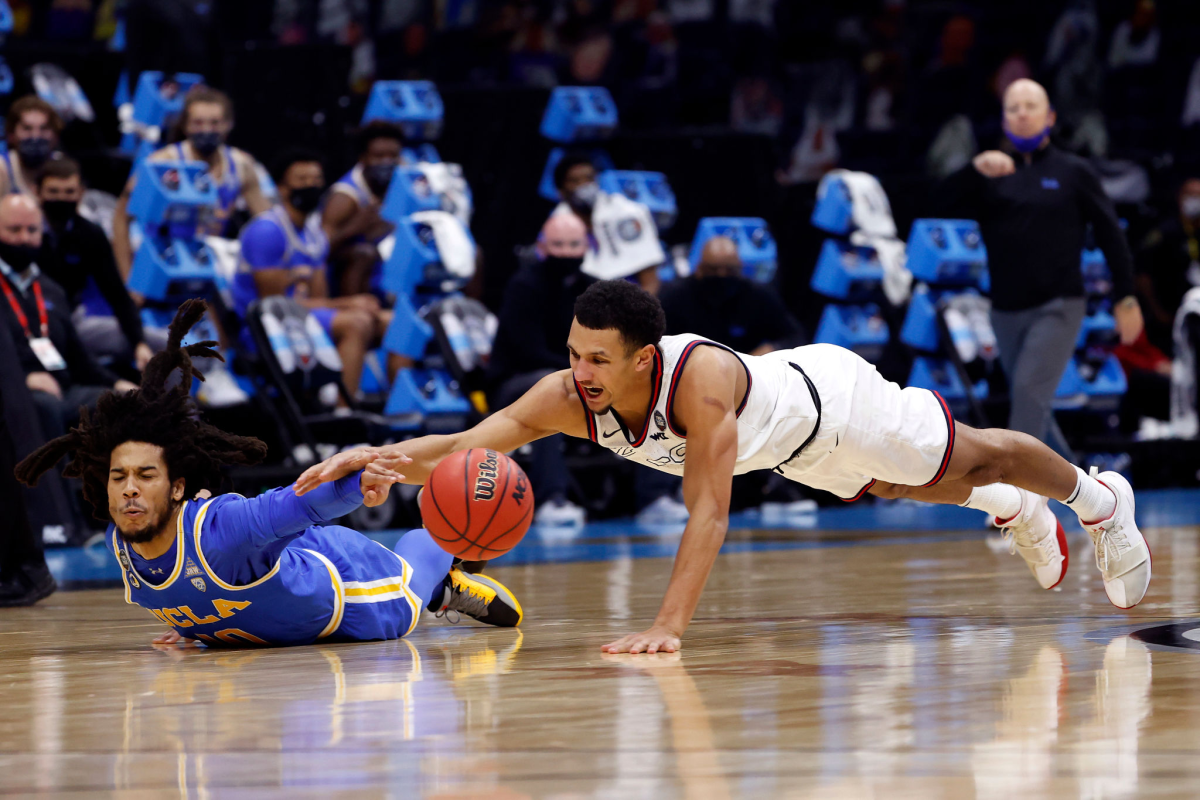 UCLA's Tyger Campbell, left, and Gonzaga's Jalen Suggs battle for a loose ball during the NCAA Final Four in April.