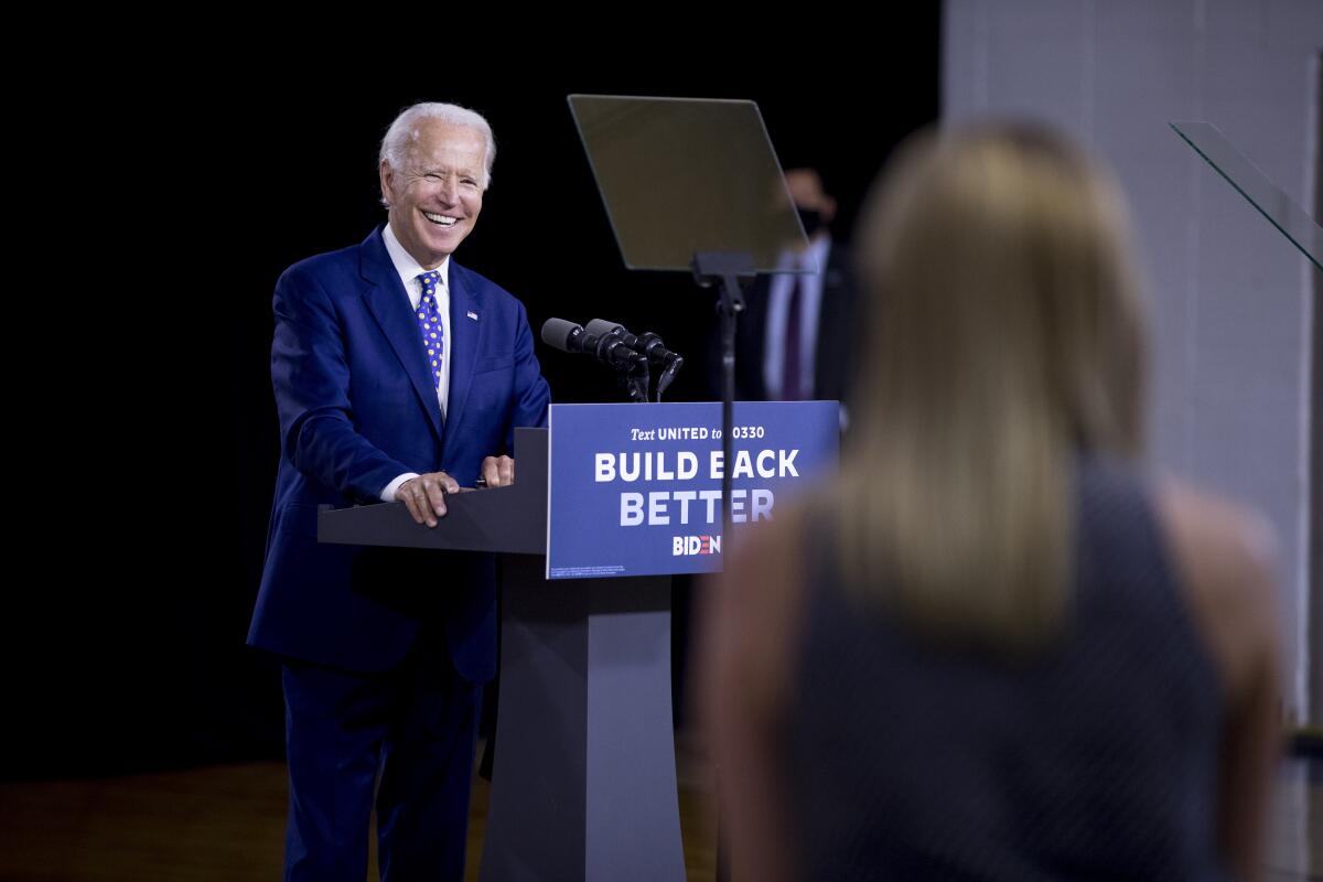 Democratic presidential candidate Joe Biden takes a question from a reporter at a campaign event in Wilmington, Del.