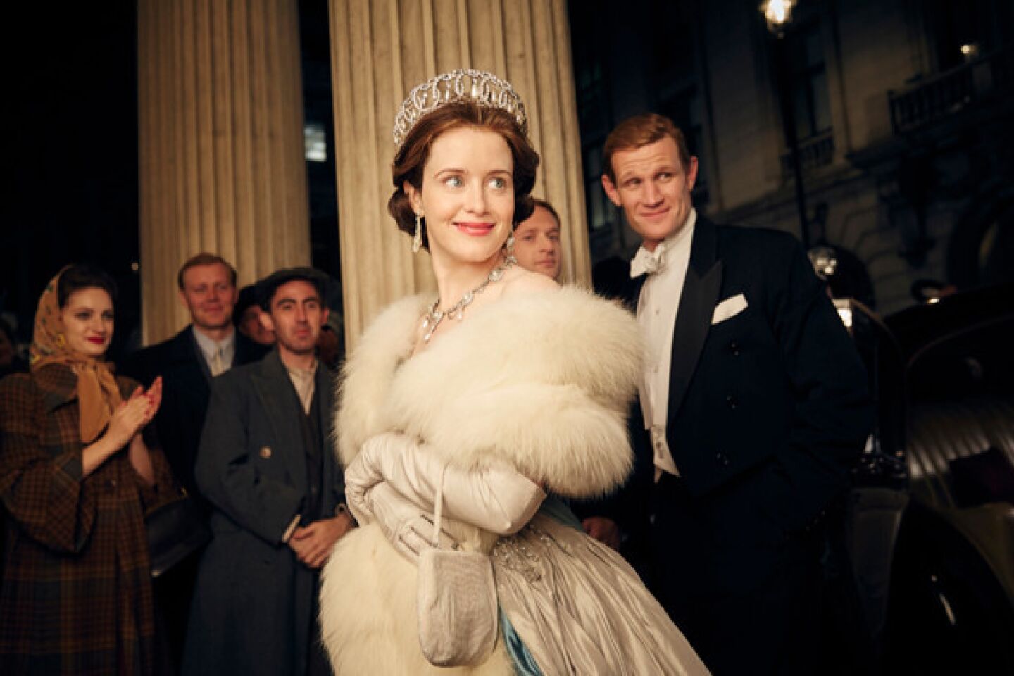 Claire Foy portrays Britain's Elizabeth II in the historical drama "The Crown" on Netflix. With Matt Smith, right.