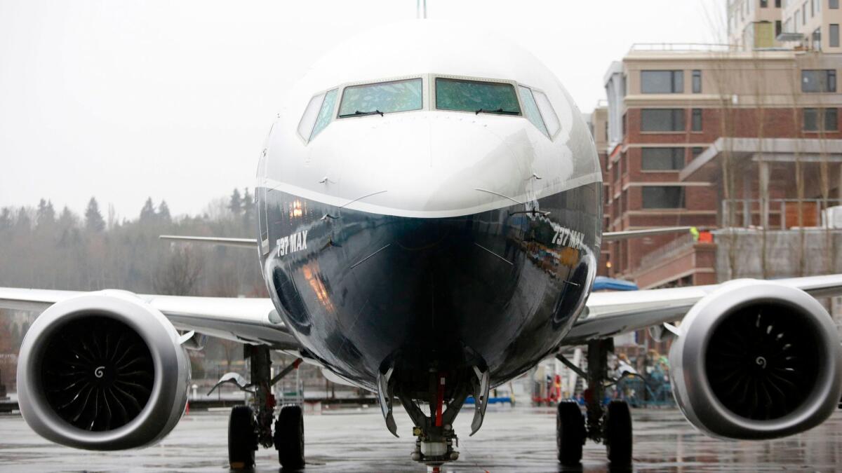 The first Boeing 737 MAX 9 airplane is pictured during its rollout for media at the Boeing factory in Renton, Wash.