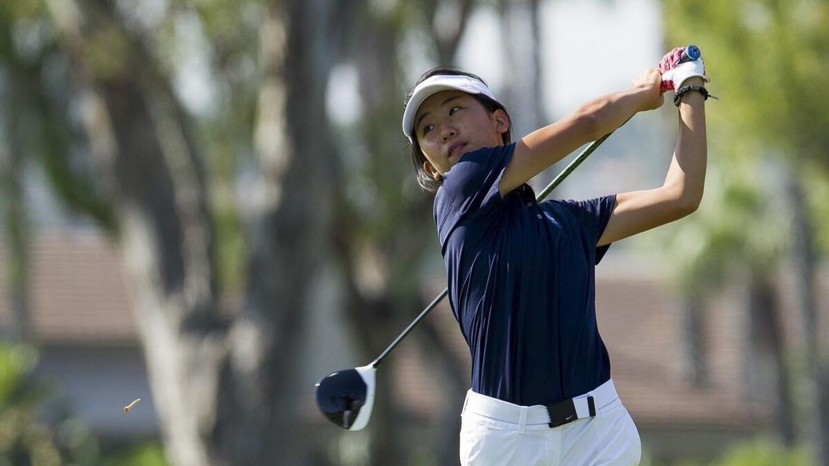 Newport Harbor High's Wa Yeung Tong, pictured teeing off against Corona del Mar on Sept. 7, helped the Sailors finish 11th in the CIF Southern Section Southern Division Team championships at Mile Square Golf Course on Monday.