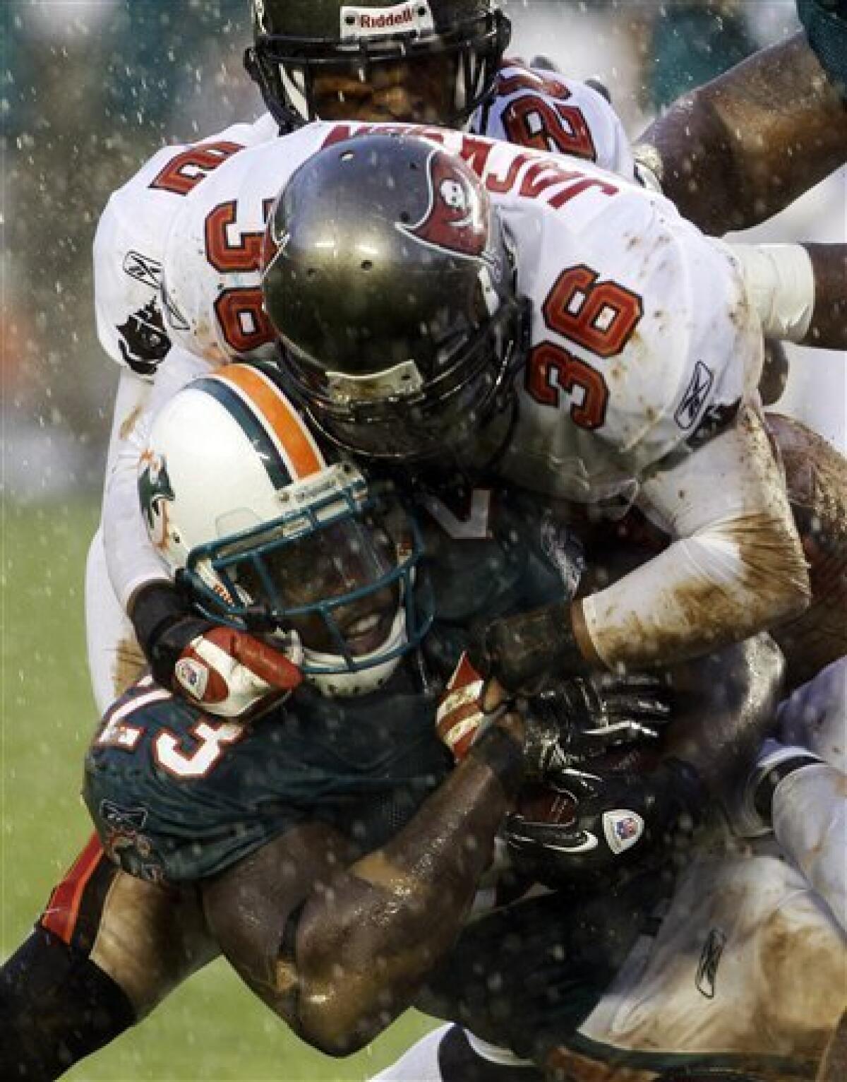 Running back Sammie Smith of the Miami Dolphins runs with the ball