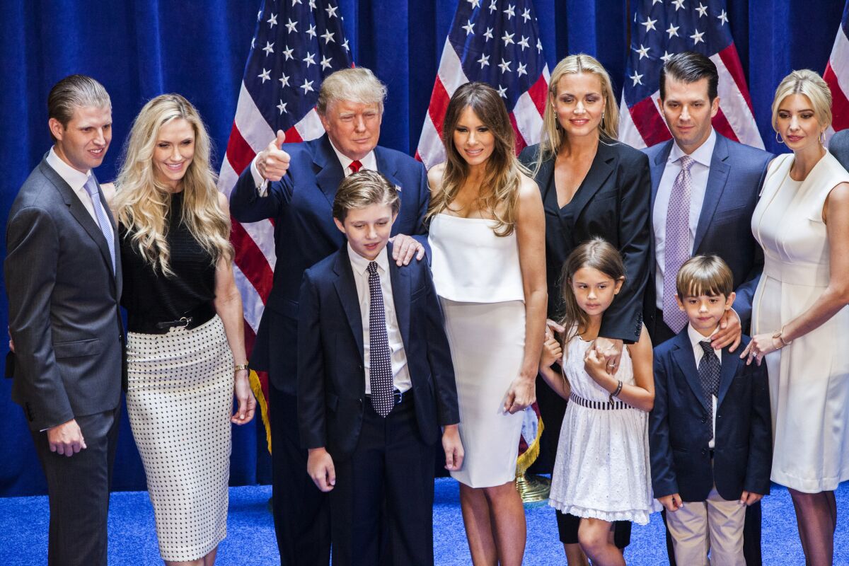Donald Trump poses with his family after announcing his candidacy for president in New York in June 2015. (Christopher Gregory / Getty Images)