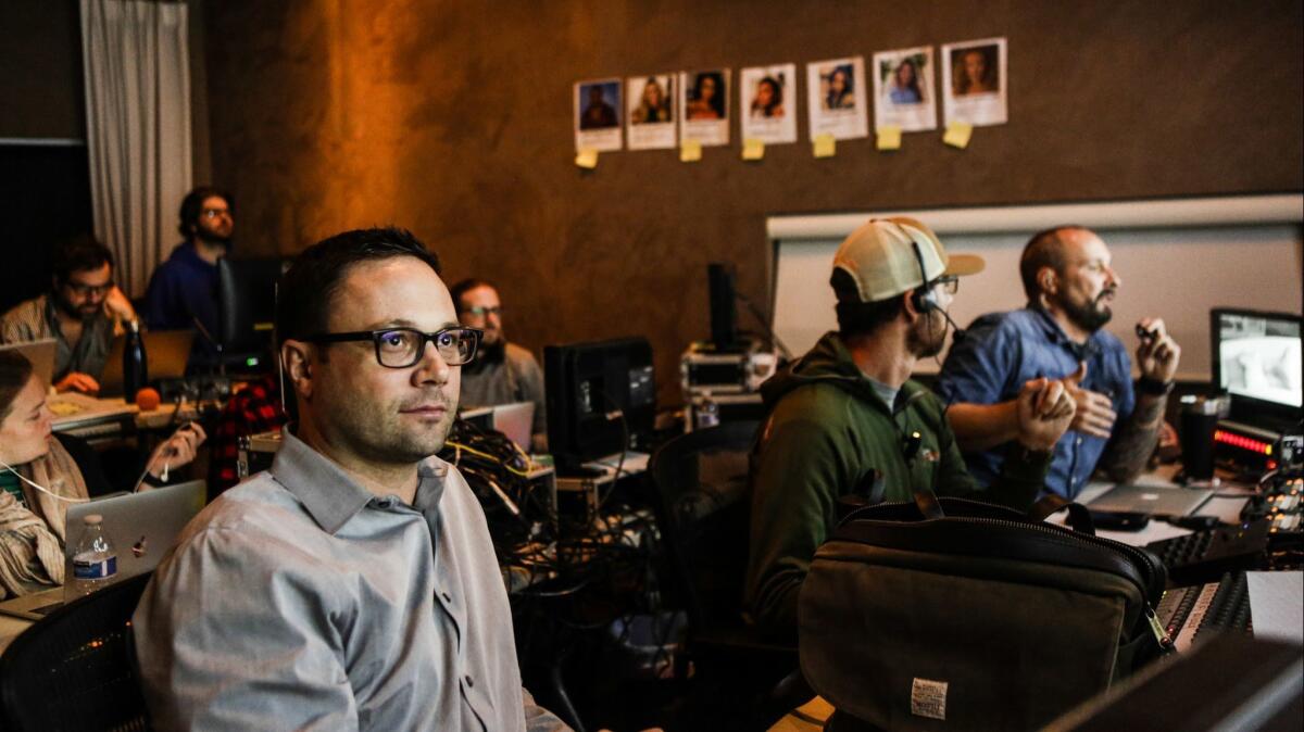 Jeff Spangler, president of Lighthearted Productions, sits in the production room with producers, editors, and the team that bring together "Relationshipped," a Facebook Watch show in which the audience chooses the main bachelor and selected dates.
