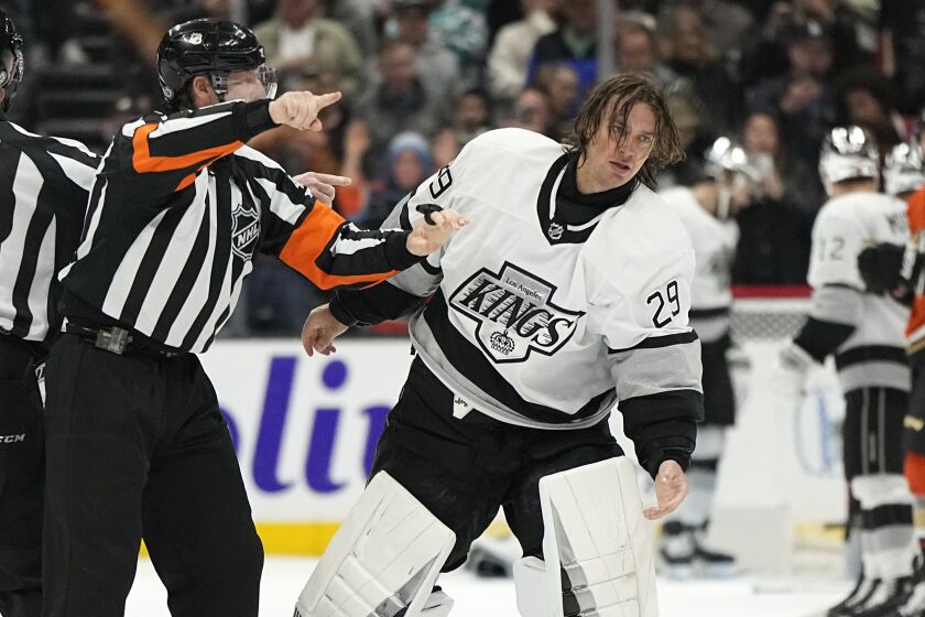 Los Angeles Kings goaltender Pheonix Copley is tossed from the game by referee Ian Walsh.