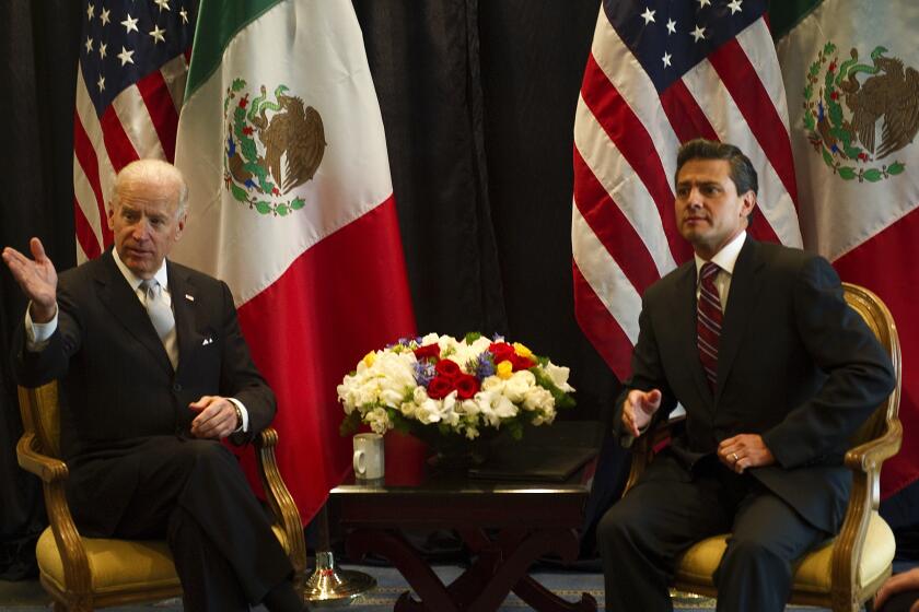 US Vice-President Joe Biden (L) speaks with Mexican presidential candidate Enrique Pena Nieto (R) of the Institutional Revolutionary Party (PRI) during a meeting on March 5, 2012 in Mexico City. US Vice President Joe Biden headed to Mexico and Honduras for a routine two-day diplomatic trip. AFP PHOTO/ Yuri CORTEZ (Photo credit should read YURI CORTEZ/AFP via Getty Images)