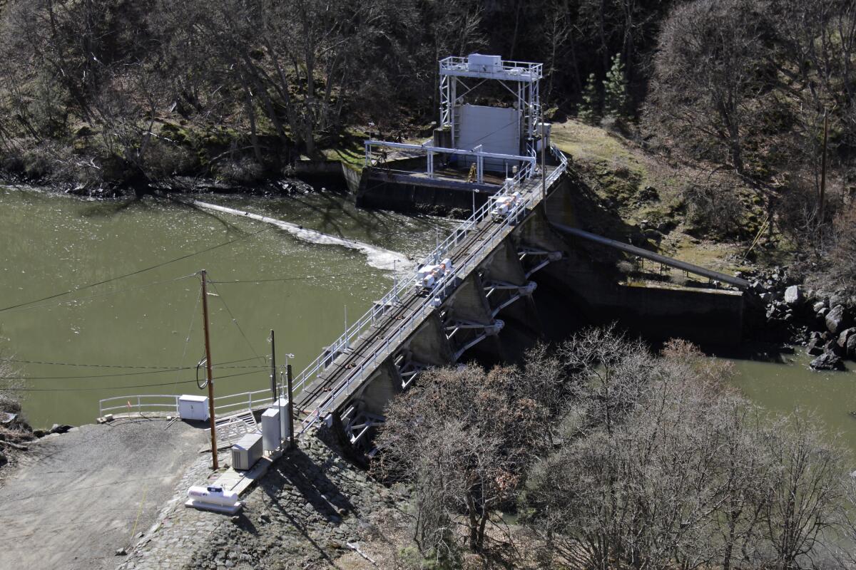 An aerial view of a small dam