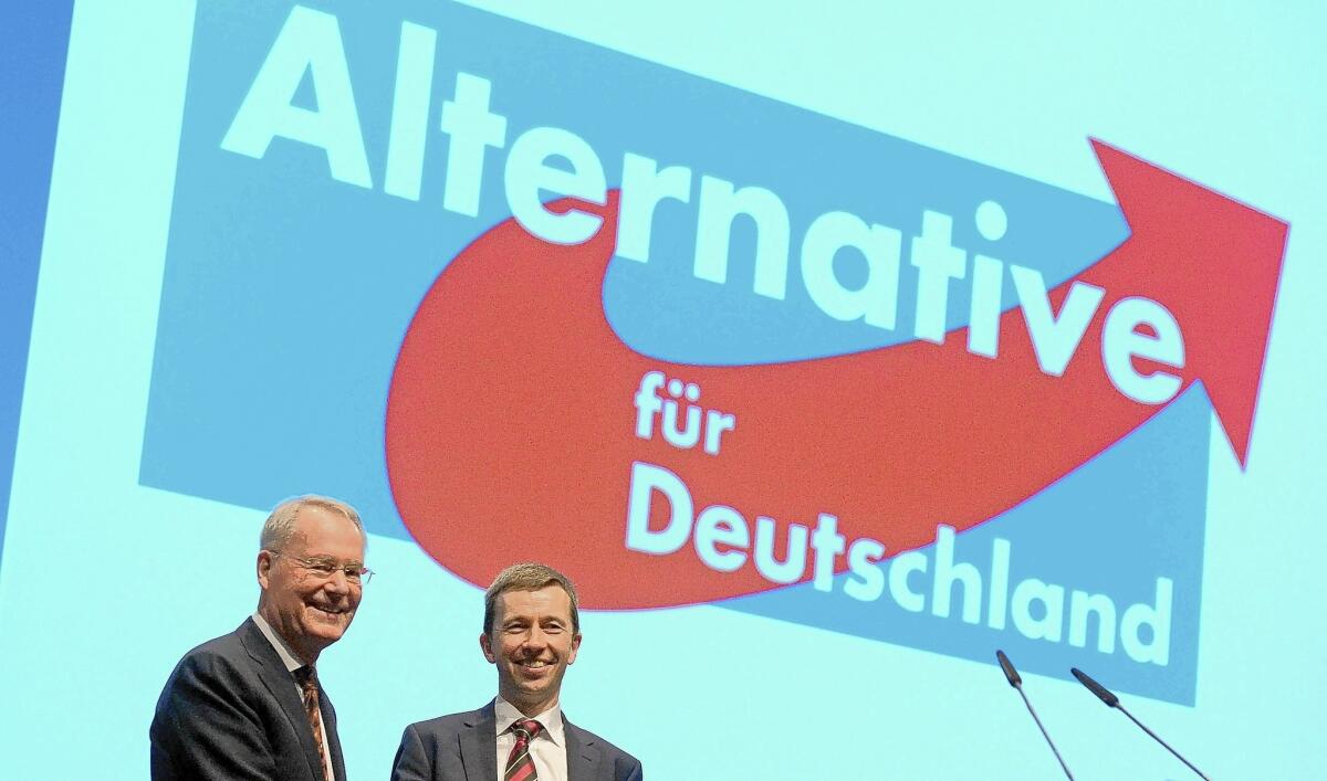 Hans-Olaf Henkel, left, and Bernd Lucke of the anti-EU Alternative for Germany party attend a party meeting in Erfurt. Henkel is a candidate in the European Parliament elections this month.