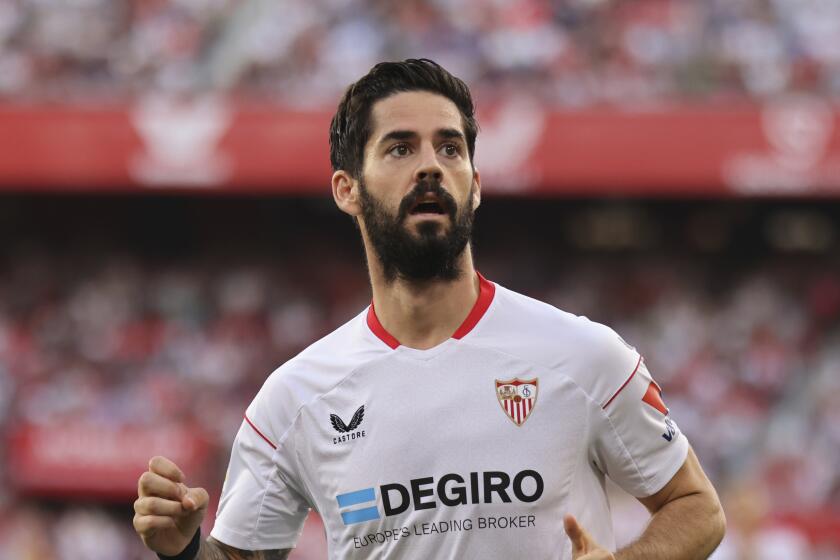 FILE - Sevilla's Isco Alarcon during a Spanish La Liga soccer match between Sevilla and Rayo Vallecano at the Ramon Sanchez-Pizjuan stadium in Sevilla, Spain, Oct. 29, 2022. Real Betis midfielder Isco Alarcón has fractured his left fibula, the Spanish club said Friday, May 17, 2024 ruling him out of a possible spot on Spain's European Championship squad. (AP Photo/Jose Luis Contreras Navarro, File)