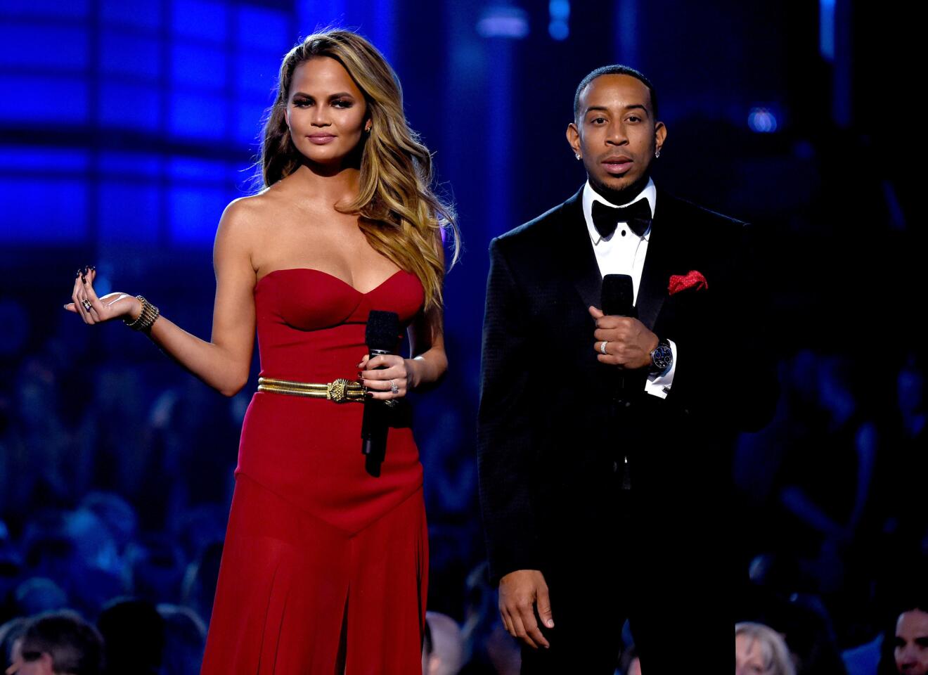 Hosts Chrissy Teigen and Ludacris speak during the 2015 Billboard Music Awards at MGM Grand Garden Arena in Las Vegas.