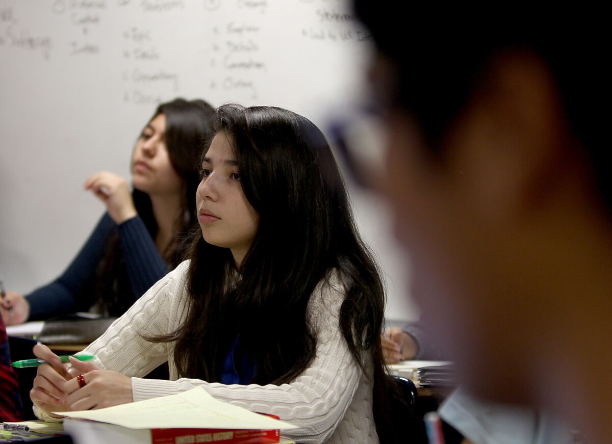 Students listen during an Advanced Placement American history class at Downtown Magnets High School in Los Angeles in 2013.