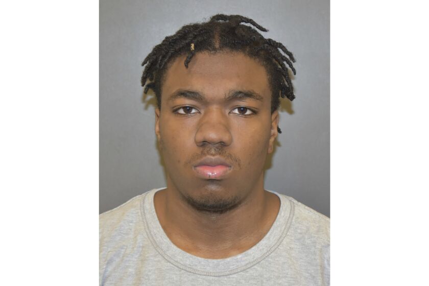 This photo released by the Bolingbrook Police Department shows 17-year old Bryion Montgomery, who was charged Monday, March 6, 2023, as an adult with multiple crimes, including first-degree murder, attempted first-degree murder and home invasion. The suburban Chicago teenager pleaded not guilty Tuesday in the fatal shootings of his 17-year-old girlfriend, a 9-year-old girl and the child's father. (Bolingbrook Police Department via AP)